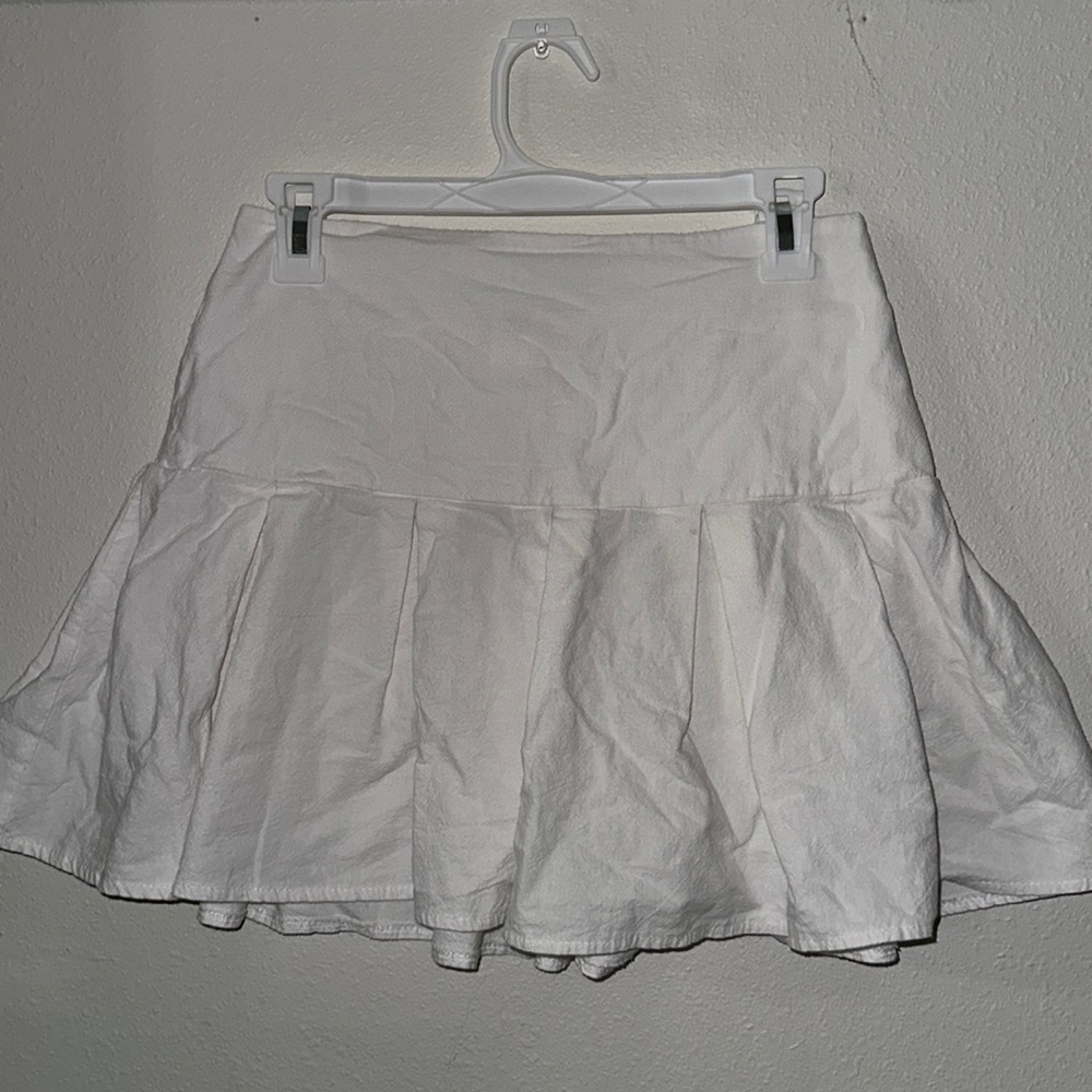 White pleated skirt